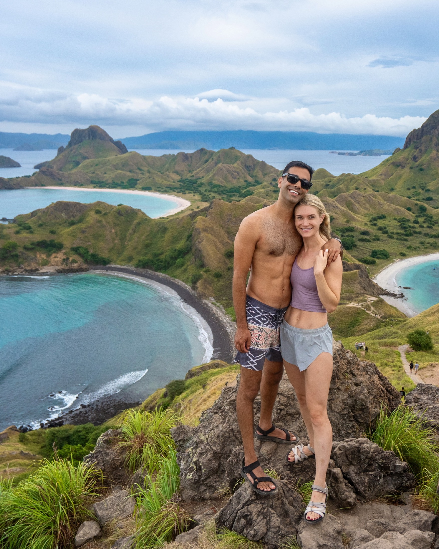 Dr. Fardis Tavangary and Dr. Megan Tavangary overlooking a coastline